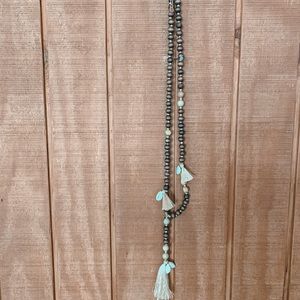 Beaded with Fraying and Seashell Detailing